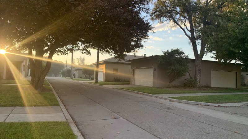 Quiet residential street with single-story homes in the Austin area