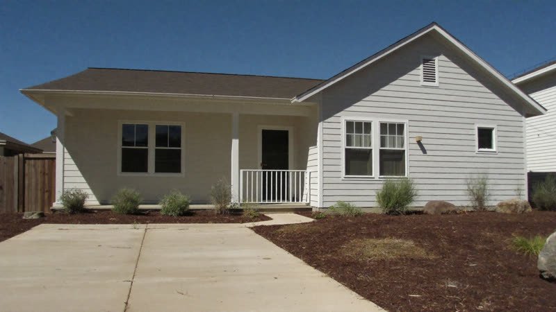 Small renovated bungalow with new siding and fresh landscaping